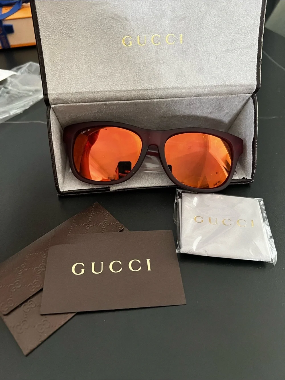 Gucci Women's Burgundy Frame Sunglasses with Orange Mirrored Lenses